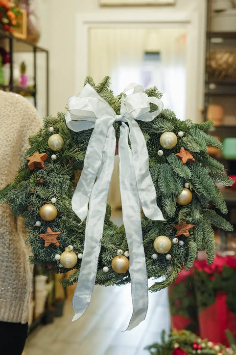 Ghirlande di Natale Emozioni Fiori Torino: l’artigianalità che profuma di pino fresco