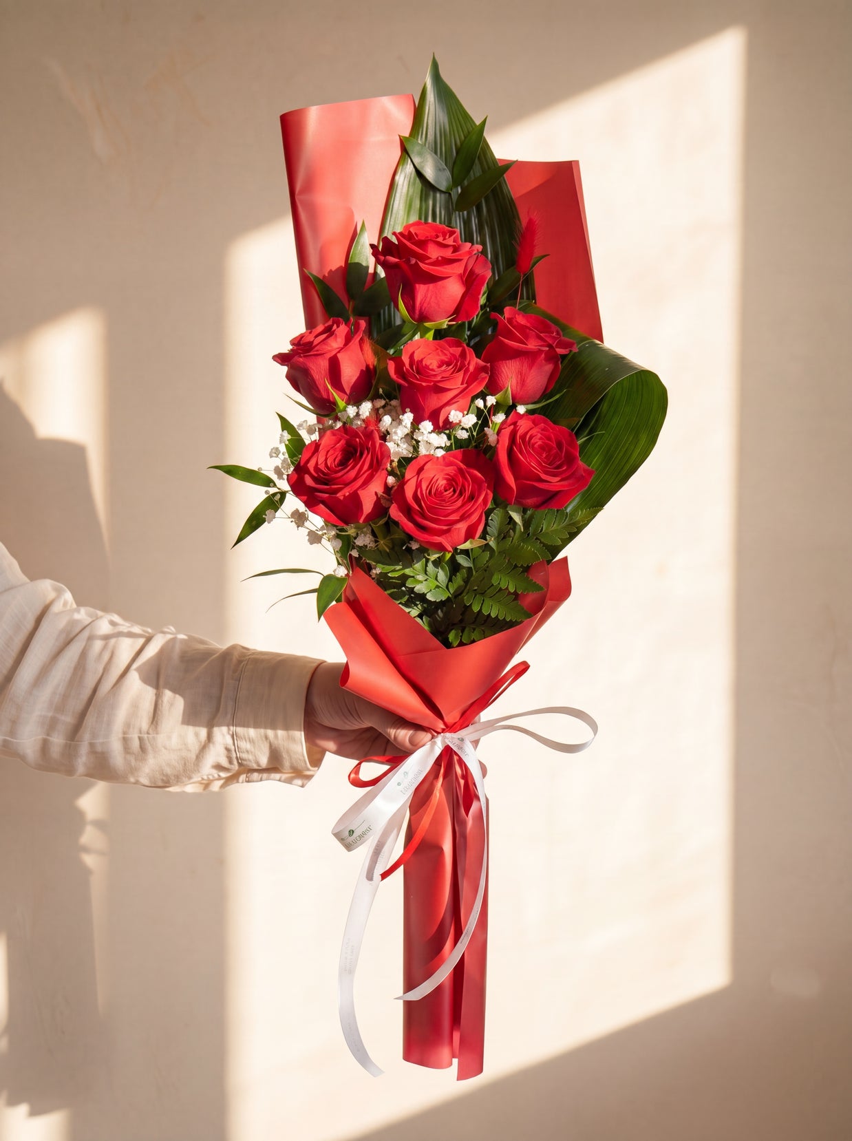 Rose rosse confezionate, 7 rose — Torino