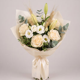 Bouquet di laurea con rose crema e spighe di grano | Emozioni Fiori Torino