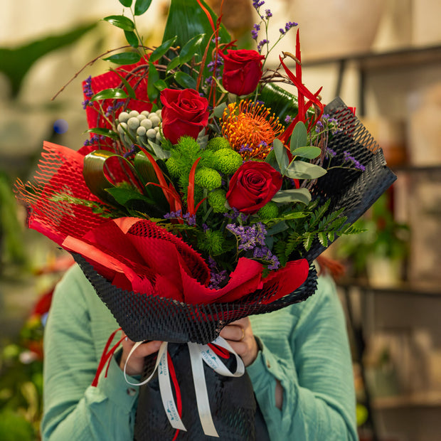 Bouquet con Rose Rosse, Protea Arancio | Consegna a Torino