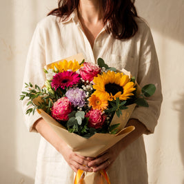 Frascheta, bouquet colorato con girasoli, gerbere e rose — consegna a Torino