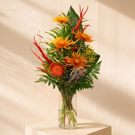 Aranciera, crisantemi arancio nel vaso — Emozioni Fiori Torino